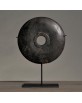 small black disk